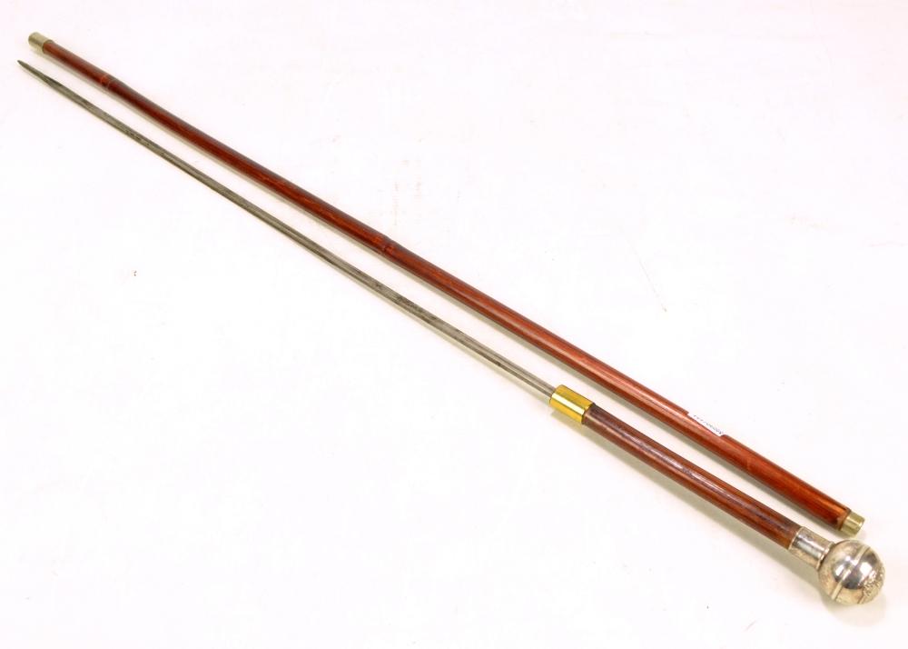 An Edwardian sword cane/swagger stick with domed silver plated cap ...