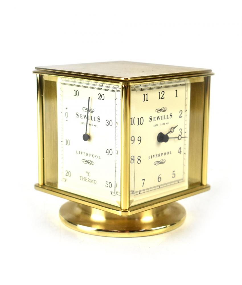 Sewills of Liverpool; a brasscased weather station with clock