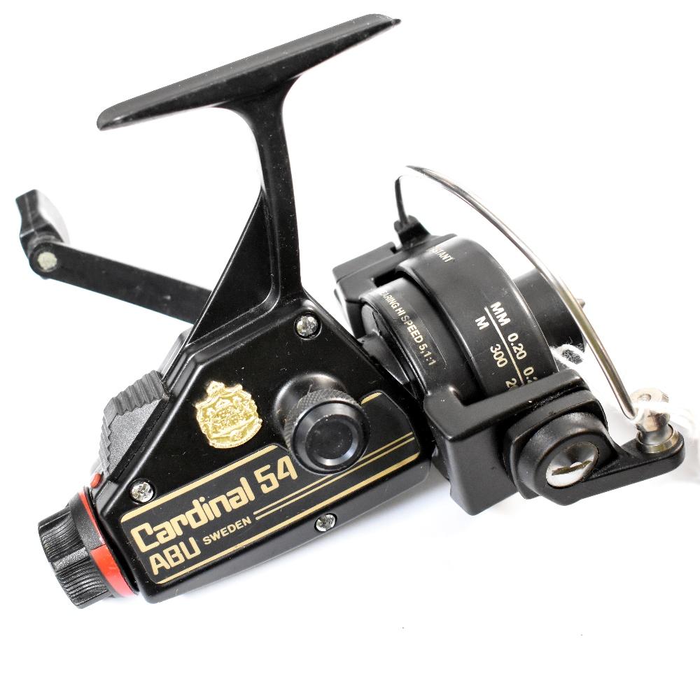 Various spinning reels to include a D.A.M Quick 5001 reel with box and  paperwork, a ABU Cardinal 54 reel with box (af), a vintage Commander S-S 77  open face spinning reel (af), used, boxed (3).