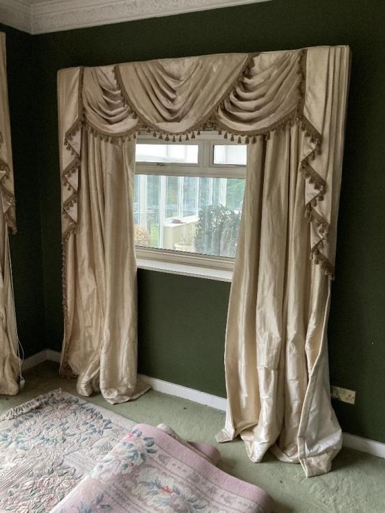 Two pairs of lined and interlined champagne coloured curtains with ...
