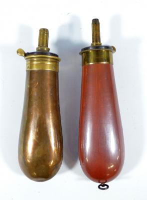 Lot - TEN BRASS AND COPPER POWDER FLASKS, Dixon & Son in the shape of a  rifle butt stock, two small bag shape with star/circle pattern, two  Remington type with patriotic eagle