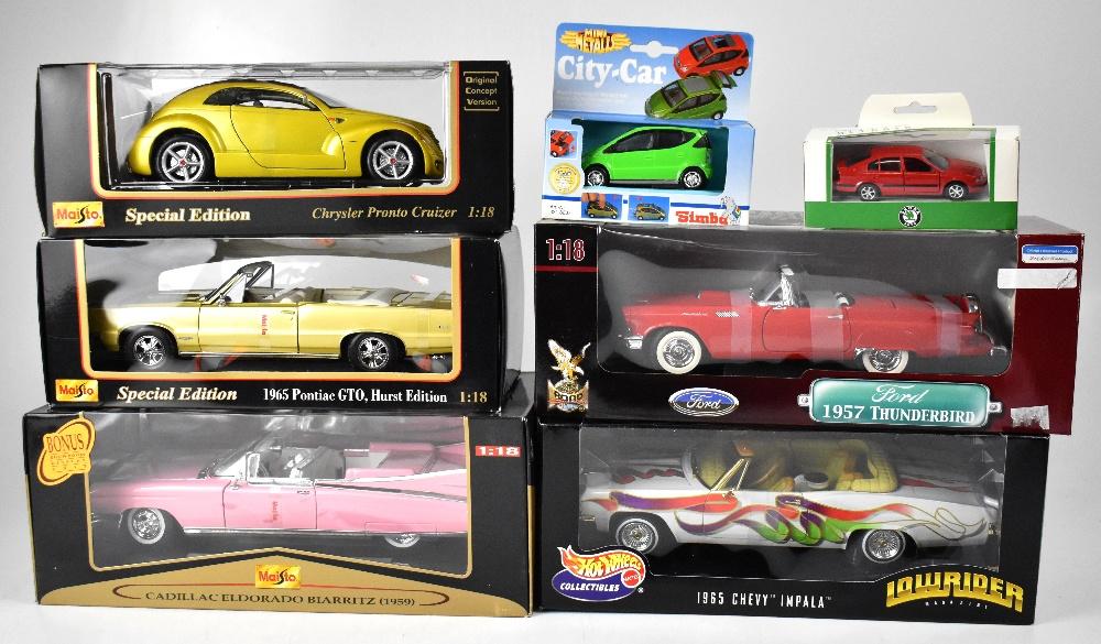 A quantity of boxed diecast scale model vehicles and boxed toy