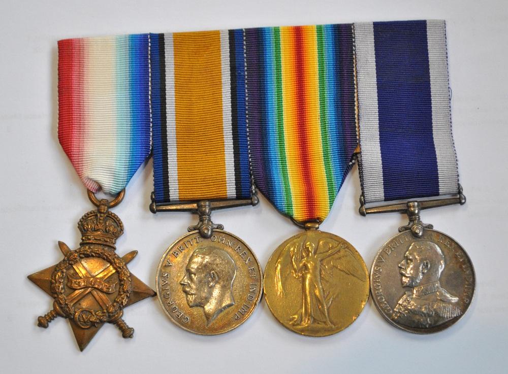 A WWI medal trio and George V Royal Naval Long Service and Good Conduct ...