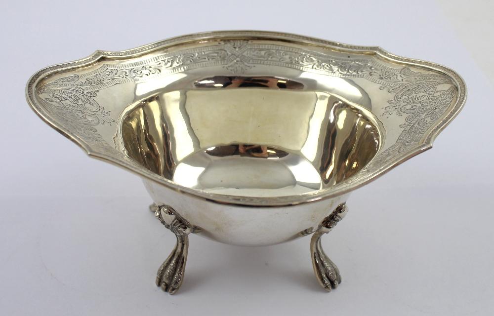 An early 20th century American silver oval bowl with chased decoration ...