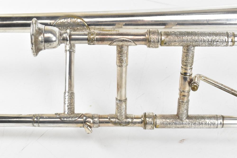 BOOSEY & HAWKES LTD; 'Imperial' silver plated bass trombone, cased with  mouthpiece. | Adam Partridge