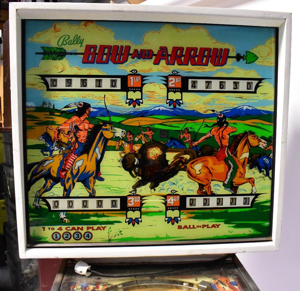 A Bally 'Bow and Arrow' pinball machine, approx 179 x 77 x 138cm
