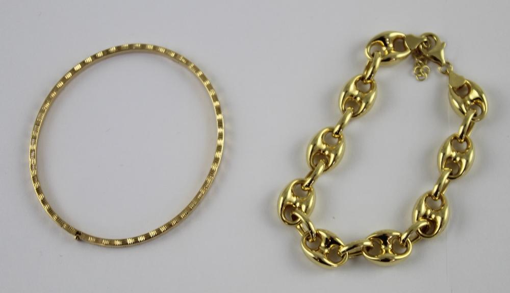 Lot 120 - A 9ct gold charm bracelet