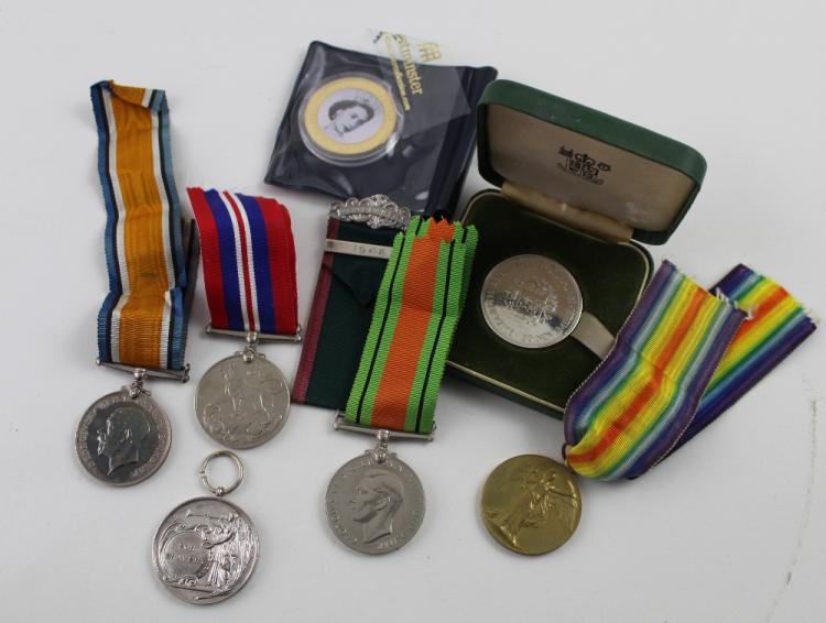 A group of medals comprising WWI War and Victory duo awarded to 40097 ...