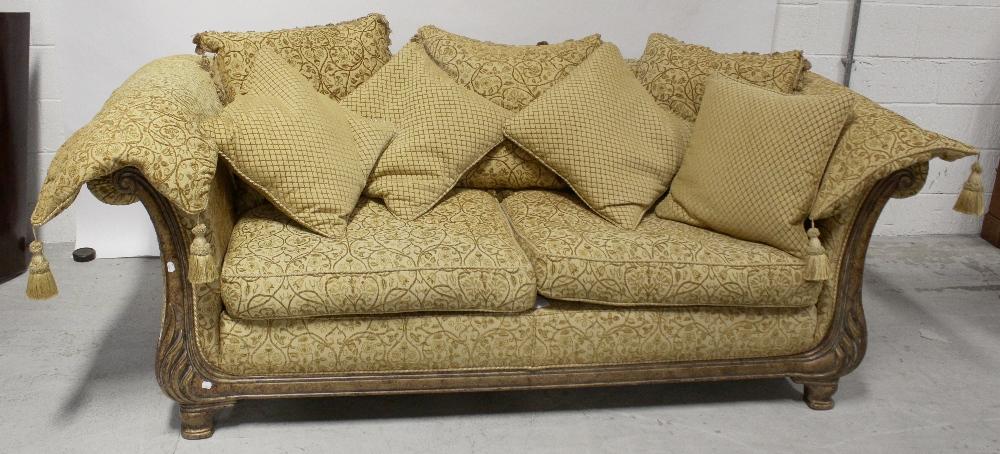 A Cousins Large Sofa In The French Style With Ornate Gilded Wooden Frame Upholstered In Gold Floral Embroidered Fabric Length 208cm With A Large Quantity Of Matching Scatter Cushions Adam Partridge