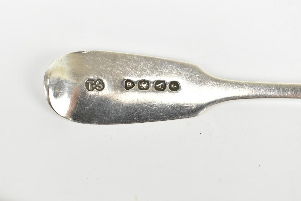 GL CONNELL LTD; a George V hallmarked silver spoon with cast crown ...